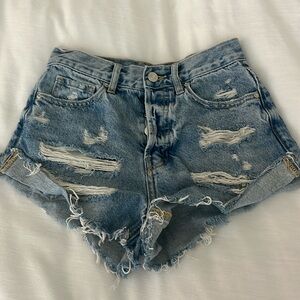 Light indigo distressed high wasted Jean shorts form pacsun